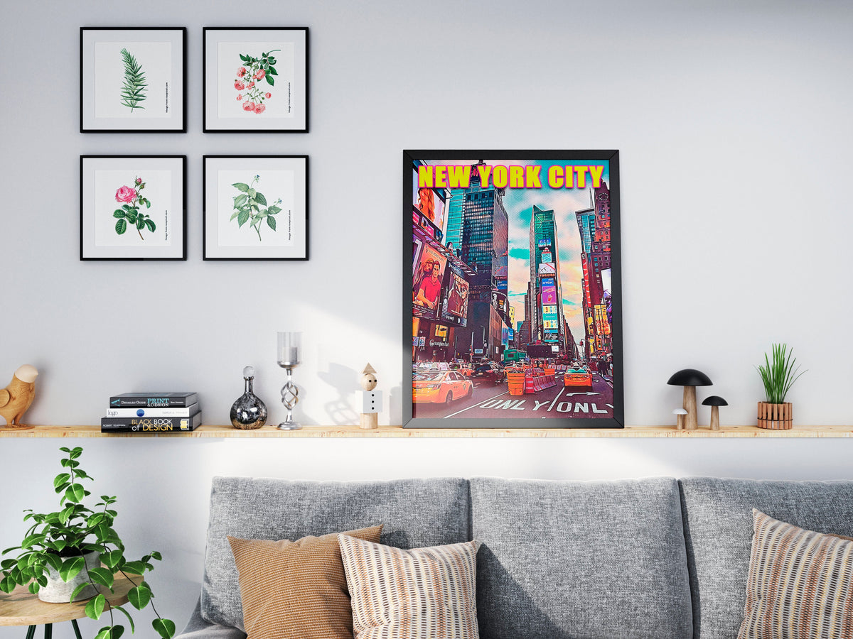 Bright NYC poster above a grey sofa, hung beside botanical prints in a modern living room